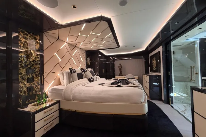 Slide: The Image of Luxurious bedroom interior of 2024 Sirena 88 yacht, featuring modern design and elegant lighting. - 133