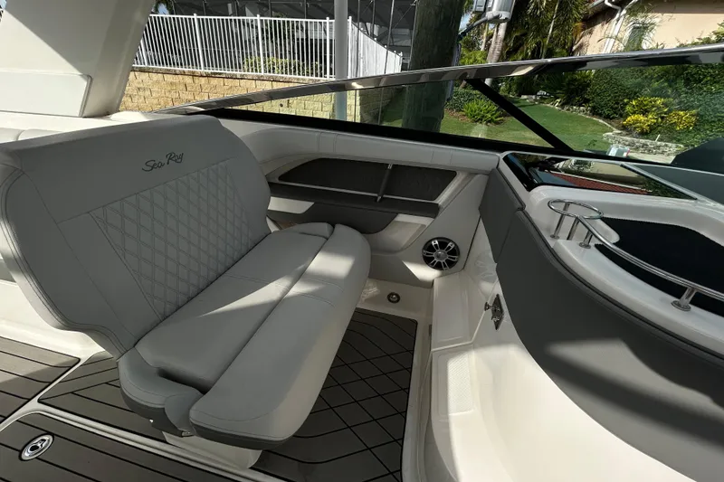 Slide: The Image of 2024 Sea Ray SLX 310 Outboard interior with luxurious seating and modern design. - 114