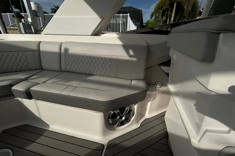 Slide: The Image of 2024 Sea Ray SLX 310 Outboard interior with luxurious seating and modern design. - 119