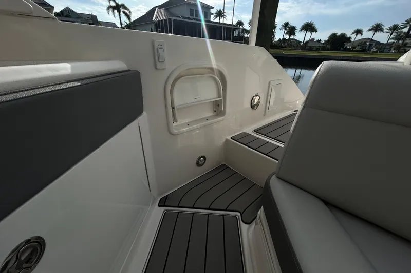 Slide: The Image of 2024 Sea Ray SLX 310 Outboard interior with sleek seating and modern design. - 127