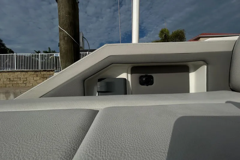 Slide: The Image of 2024 Sea Ray SLX 310 Outboard interior detail with sleek, modern design elements. - 133
