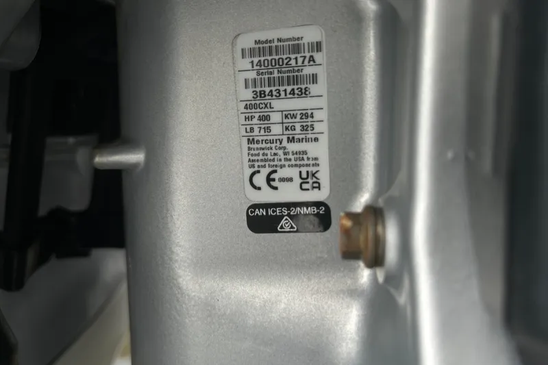 Slide: The Image of Label on Mercury Marine engine, 2024 Sea Ray SLX 310 Outboard, showing model and specifications. - 148