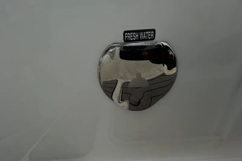 Slide: The Image of Fresh water access on 2024 Sea Ray SLX 310 Outboard boat. - 23