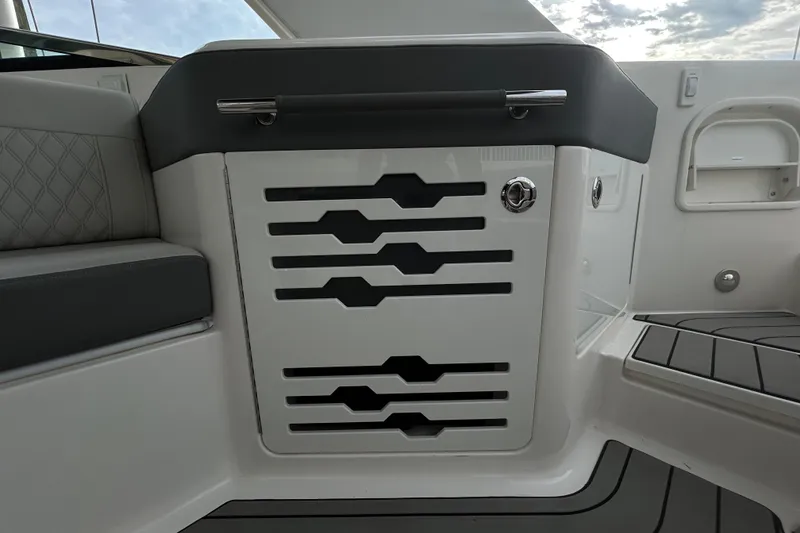 Slide: The Image of Interior of 2024 Sea Ray SLX 310 Outboard boat, featuring sleek seating and modern design. - 37