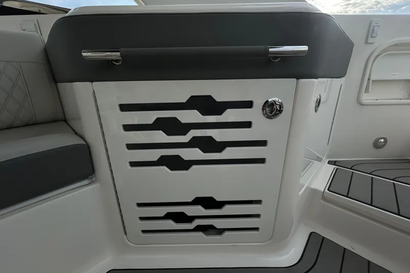 Slide: The Image of 2024 Sea Ray SLX 310 Outboard interior detail with sleek design and modern finishes. - 43