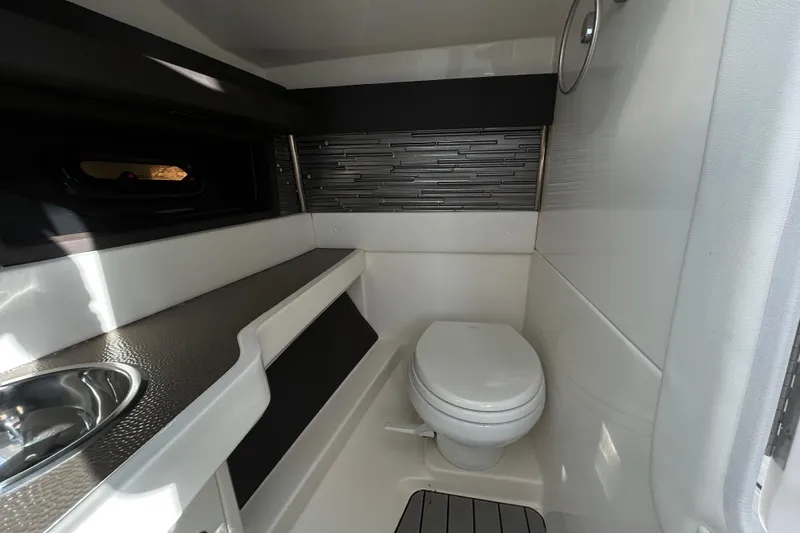 Slide: The Image of Luxurious bathroom interior of 2024 Sea Ray SLX 310 Outboard boat. - 58