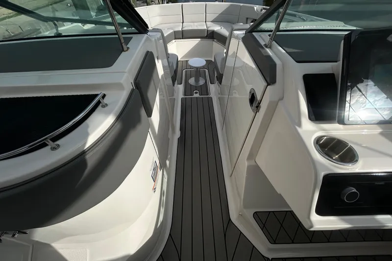 Slide: The Image of 2024 Sea Ray SLX 310 Outboard interior with sleek seating and modern design. - 81