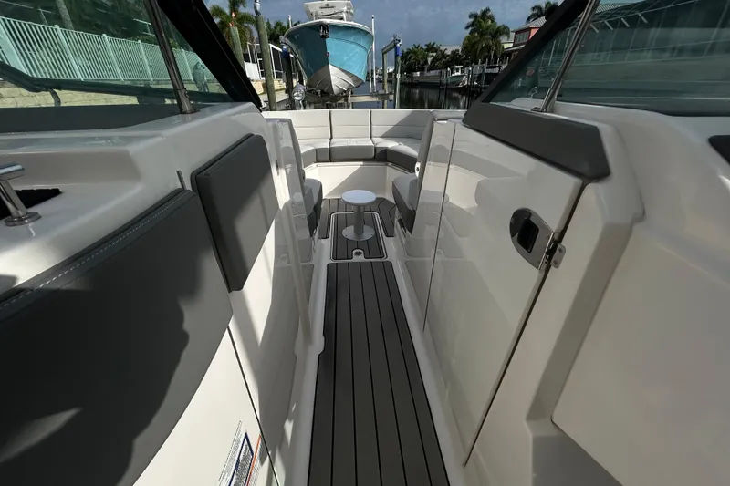 Slide: The Image of 2024 Sea Ray SLX 310 Outboard interior with sleek seating and modern design. - 82