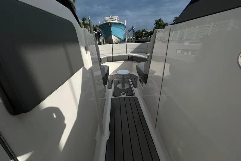Slide: The Image of 2024 Sea Ray SLX 310 Outboard interior with sleek seating and modern design. - 83