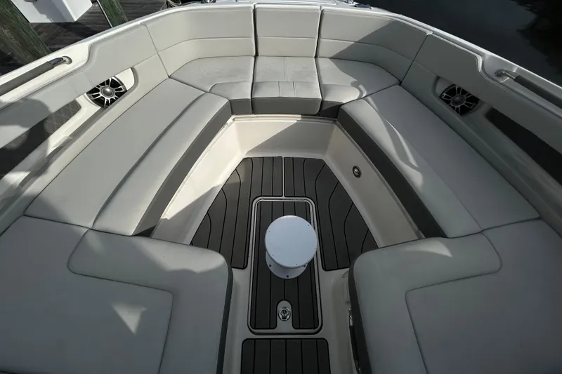 Slide: The Image of Luxurious seating area on 2024 Sea Ray SLX 310 Outboard boat. - 90