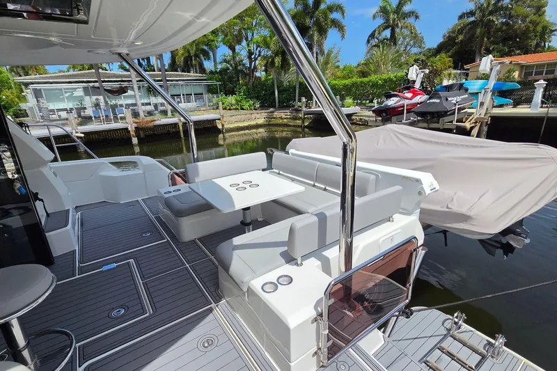 Slide: The Image of Aquila 44 Yacht 2020 model with sleek deck design and modern seating area. - 31