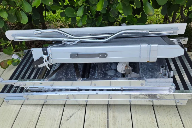 Slide: The Image of Folded metal gangway for 2020 Aquila 44 Yacht on wooden deck. - 42