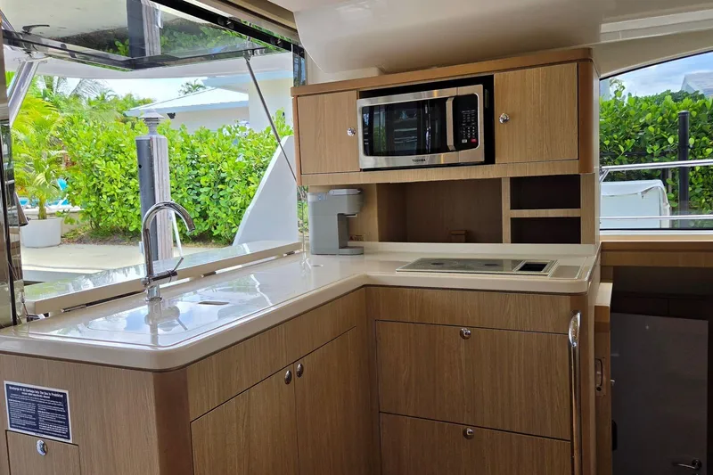 Slide: The Image of Modern kitchen interior of 2020 Aquila 44 Yacht with microwave and sink. - 9