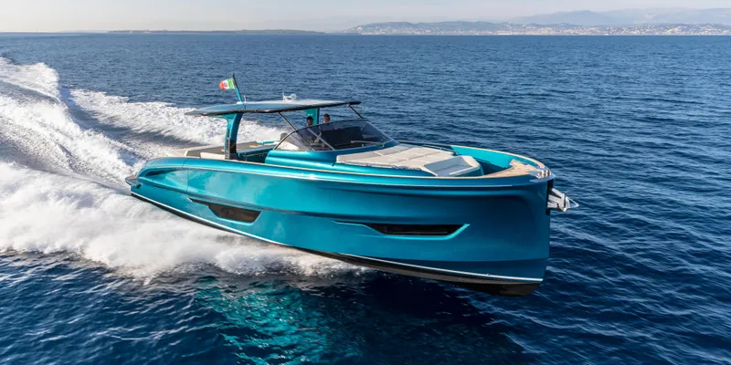 Slide: The Image of 2024 Solaris Power 52 Open yacht cruising on open sea, showcasing sleek design and vibrant blue color. - 7