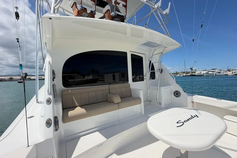 Slide: The Image of 2012 Viking 50 Convertible yacht with seating area and ocean view. - 15
