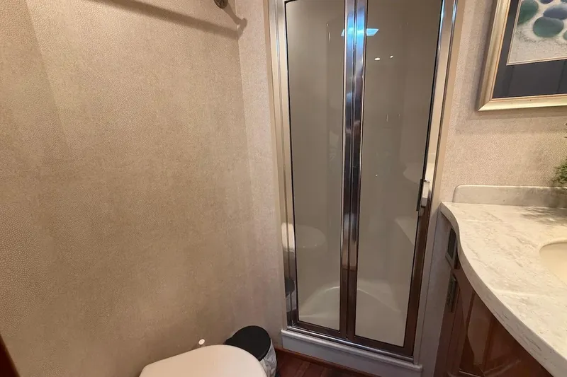 Slide: The Image of Bathroom interior of 2012 Viking 50 Convertible yacht with shower and toilet. - 30