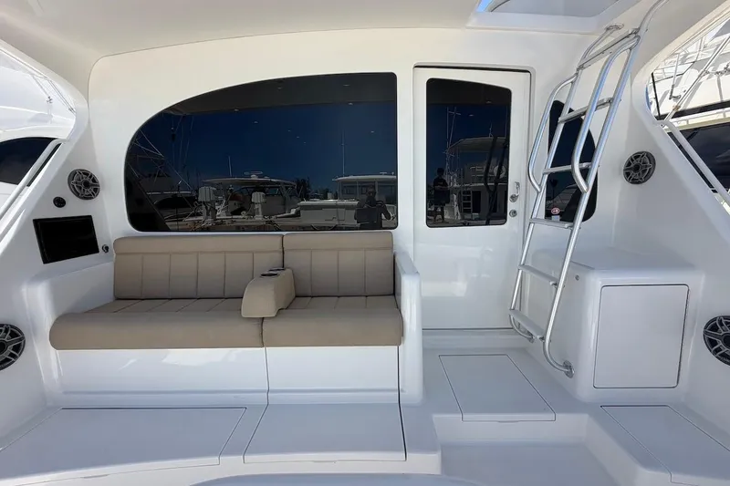 Slide: The Image of Luxurious 2012 Viking 50 Convertible yacht interior with seating and ladder. - 37