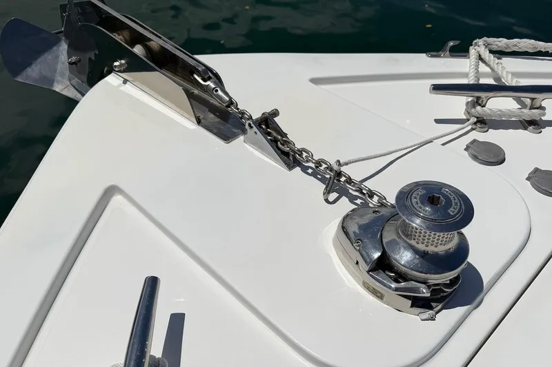 Slide: The Image of Anchor and winch system on 2012 Viking 50 Convertible yacht deck. - 52