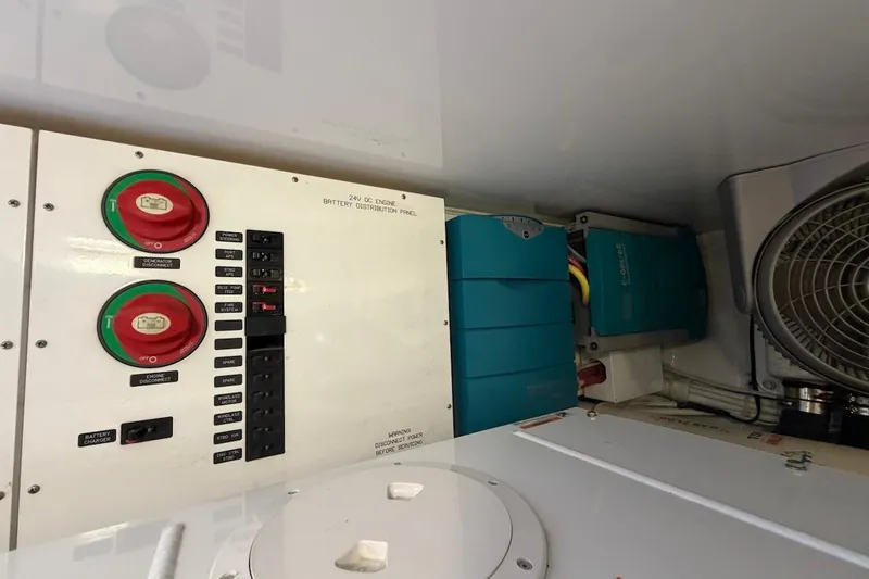 Slide: The Image of Electrical panel in a 2012 Viking 50 Convertible yacht engine room. - 64