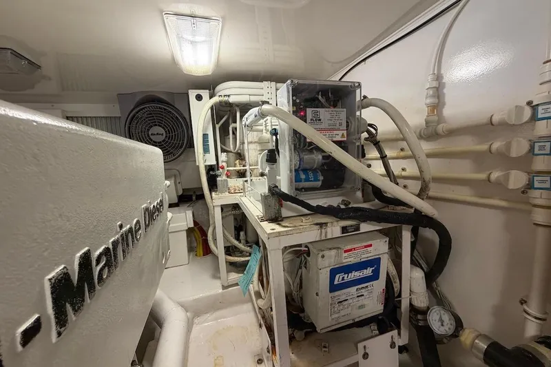 Slide: The Image of Engine room of 2012 Viking 50 Convertible yacht with marine diesel components. - 67