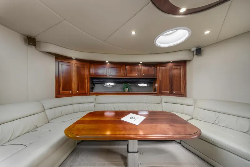 Slide: The Image of Luxurious interior of 2007 Cruisers Yachts 560 Express with elegant wood and leather seating. - 18