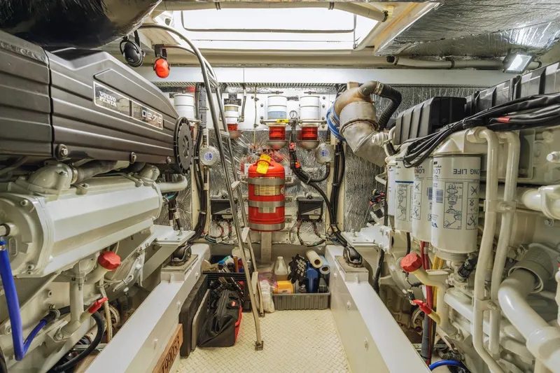 Slide: The Image of Engine room of a 2007 Cruisers Yachts 560 Express with Volvo Penta engines. - 32