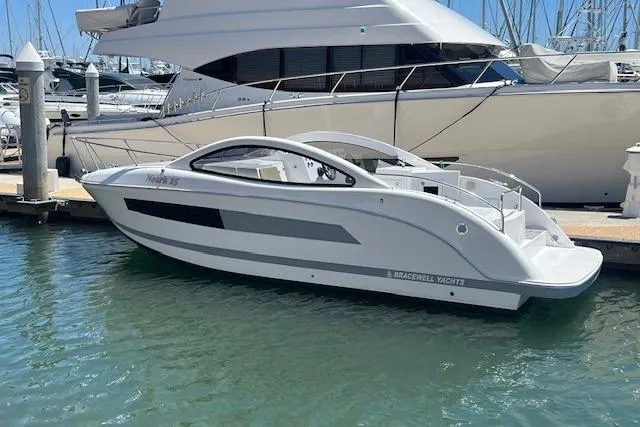 The Image of 2024 Bracewell 25 yacht docked in marina, sleek design, modern features. - 1