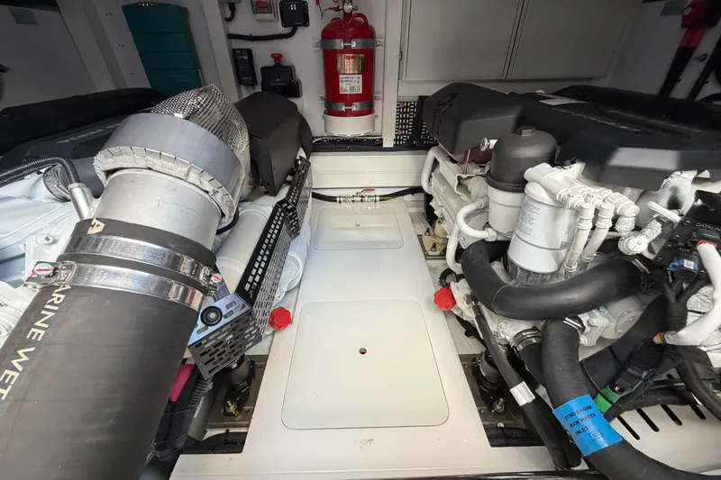 Slide: The Image of Engine room of a 2027 Princess F50 yacht, featuring advanced machinery and fire safety equipment. - 35