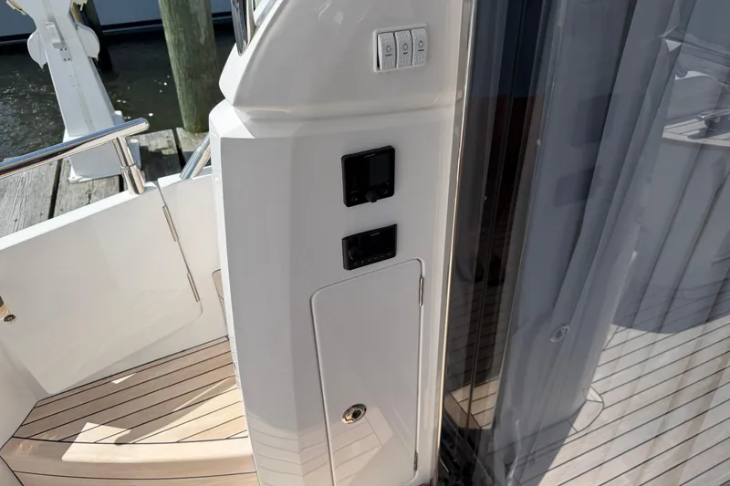 Slide: The Image of Control panel on a 2027 Princess F50 yacht, featuring sleek design and modern technology. - 65