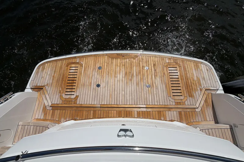Slide: The Image of Teak deck of 2027 Princess F50 yacht, overlooking water. - 19