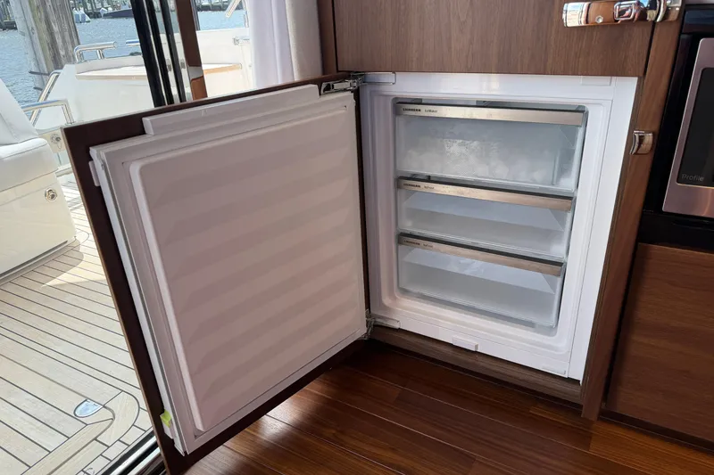 Slide: The Image of Open freezer on Princess F50 yacht, showcasing three spacious drawers. - 73