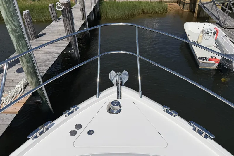 Slide: The Image of Bow view of 2027 Princess F50 yacht docked at marina. - 42