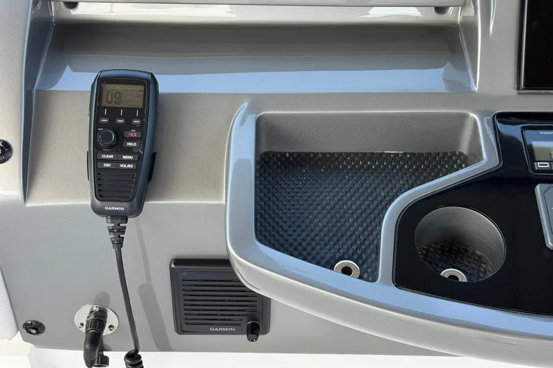 Slide: The Image of Control panel of 2027 Princess F50 yacht with Garmin radio and cup holder. - 61