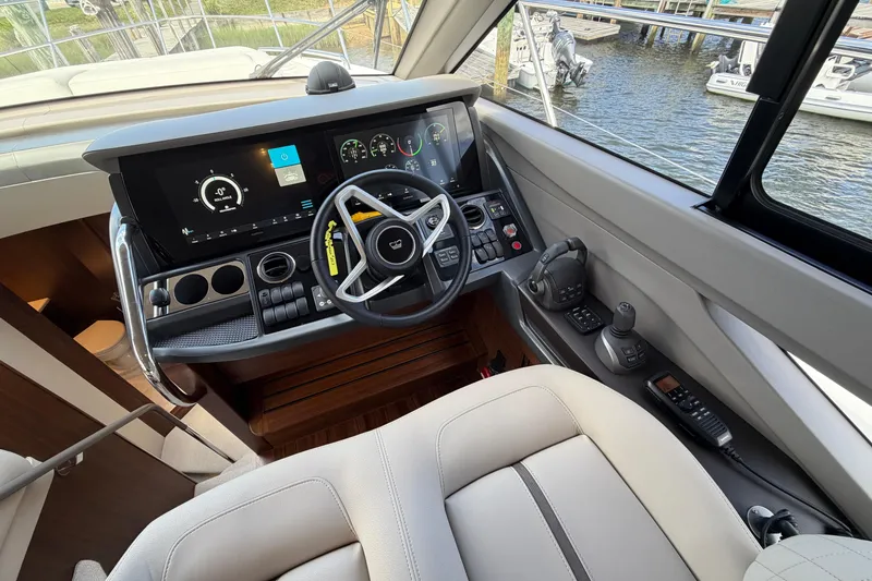 Slide: The Image of Modern helm of 2027 Princess F50 yacht with advanced navigation controls and digital displays. - 87