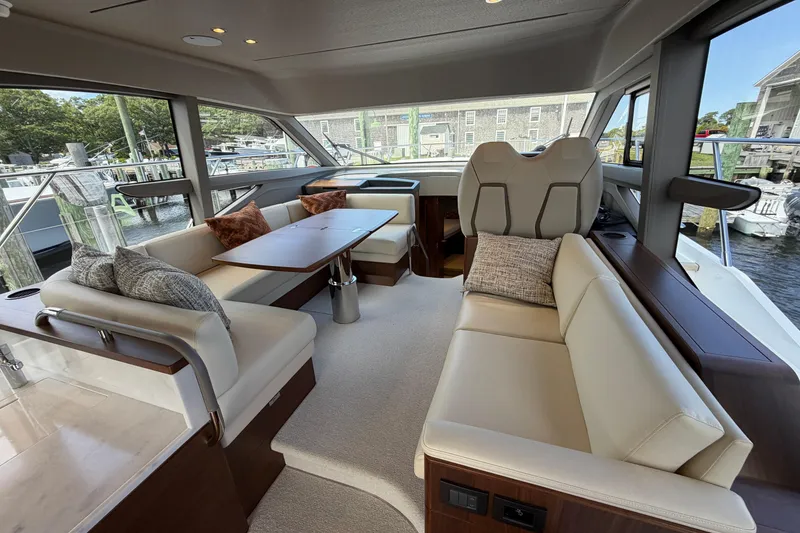 Slide: The Image of Luxurious interior of 2027 Princess F50 yacht with elegant seating and dining area. - 81