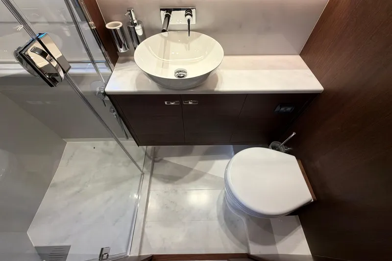 Slide: The Image of Modern bathroom in 2027 Princess F50 yacht with sleek fixtures and elegant design. - 126