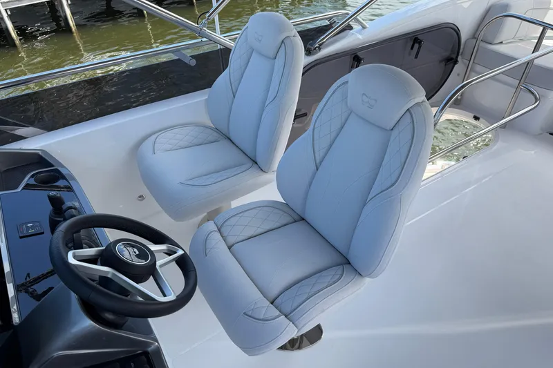 Slide: The Image of Luxury seating and steering area of 2027 Princess F50 yacht. - 55