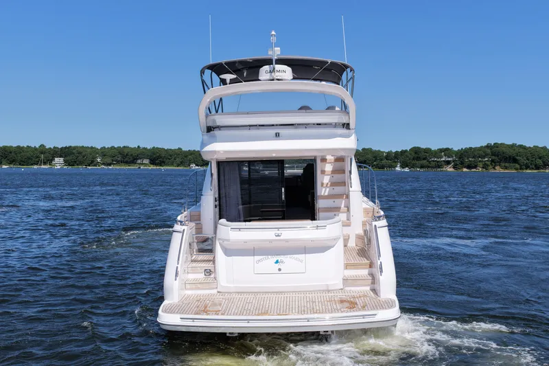 Slide: The Image of Rear view of 2027 Princess F50 yacht cruising on a sunny day. - 9