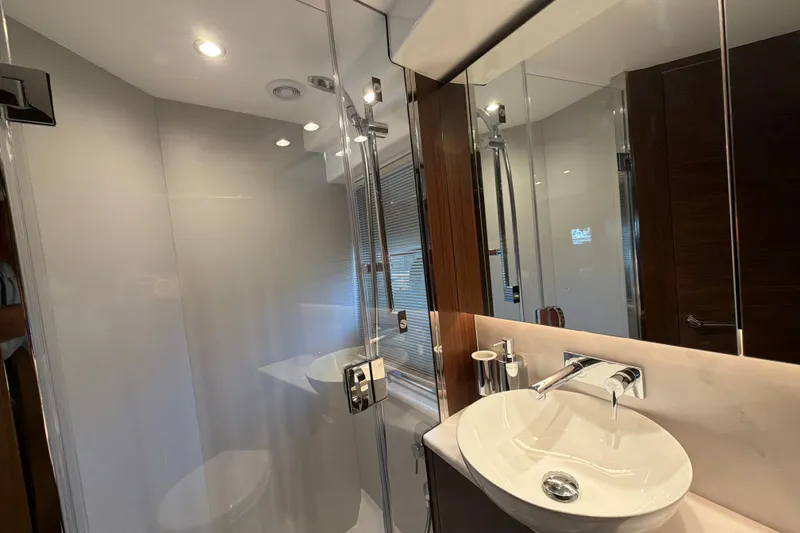 Slide: The Image of Luxurious bathroom interior of 2027 Princess F50 yacht, featuring modern fixtures and elegant design. - 105