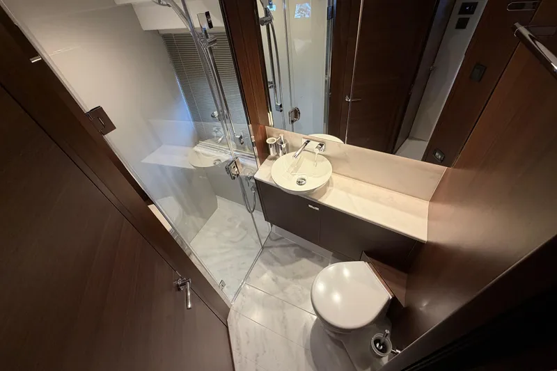 Slide: The Image of Luxurious bathroom in 2027 Princess F50 yacht, featuring modern fixtures and elegant design. - 103