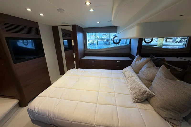 Slide: The Image of Luxurious bedroom interior of 2027 Princess F50 yacht with elegant bedding and modern design. - 114