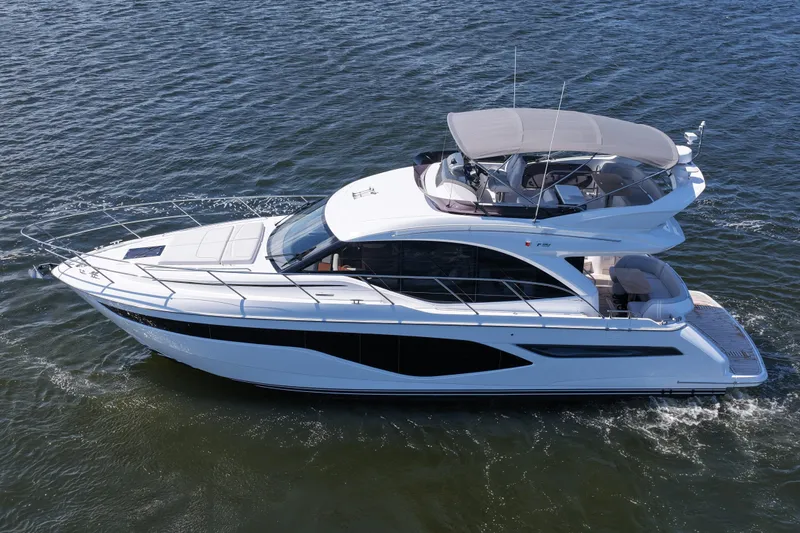 Slide: The Image of Luxurious 2027 Princess F50 yacht cruising on open water, showcasing sleek design and elegance. - 16