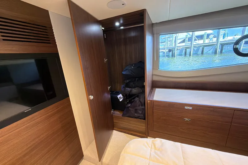 Slide: The Image of Luxurious interior of 2027 Princess F50 yacht with wood finishes and waterfront view. - 118