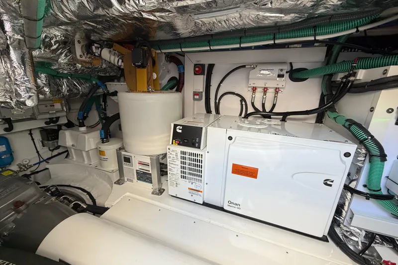 Slide: The Image of Engine room of a 2027 Princess F50 yacht with Onan Marine generator. - 33