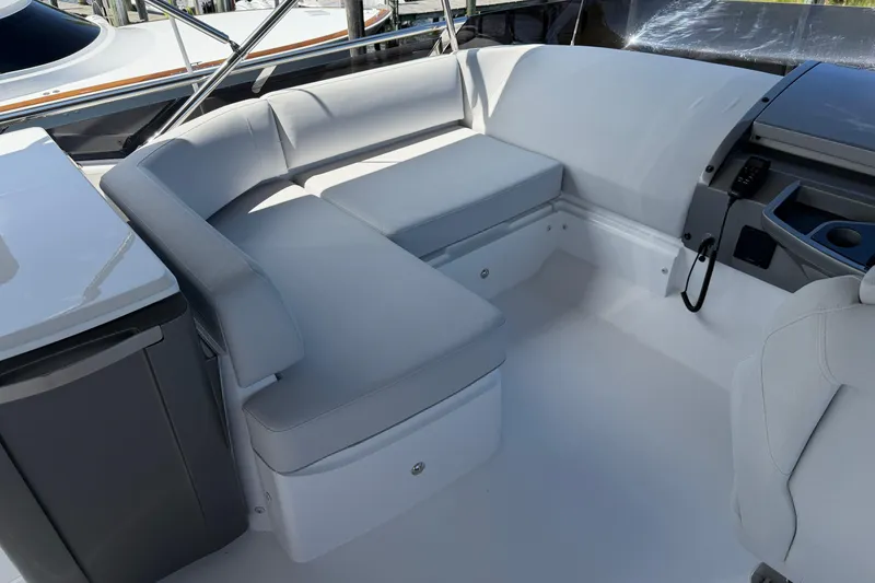 Slide: The Image of Luxurious seating area on a 2027 Princess F50 yacht, featuring sleek, modern design. - 54
