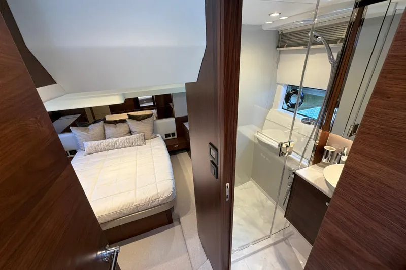Slide: The Image of Luxurious interior of 2027 Princess F50 yacht featuring bedroom and bathroom. - 110