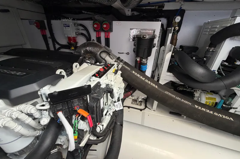 Slide: The Image of Engine room of a 2027 Princess F50 yacht, featuring Volvo Penta components. - 36
