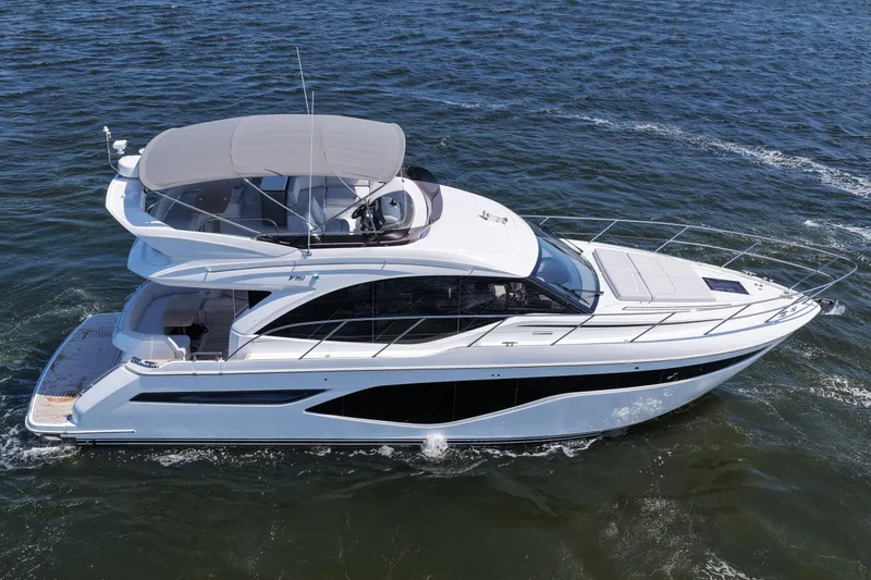 Slide: The Image of 2027 Princess F50 yacht cruising on open water, showcasing sleek design and luxury features. - 14