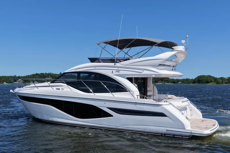 Slide: The Image of 2027 Princess F50 yacht cruising on a sunny day, showcasing sleek design and luxury features. - 7