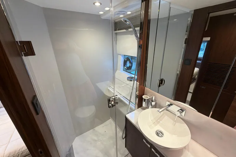 Slide: The Image of Luxurious bathroom in 2027 Princess F50 yacht, featuring modern fixtures and elegant design. - 127